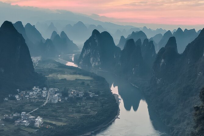 1-Day Guilin Tour to Reed Flute Cave, Xianggong Hill, Bamboo Boat and Night Show - Reed Flute Cave: a colorful start beneath Guilin