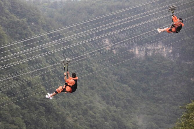 1-Day Private Tour to Glass Bridge & Yellow Dragon Cave - Walking across Zhangjiajie Glass Bridge