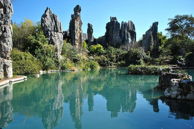 1 Day Stone Forest & Jiuxiang Cave Tour - Entering the Stone Forest after a 1.5-hour drive