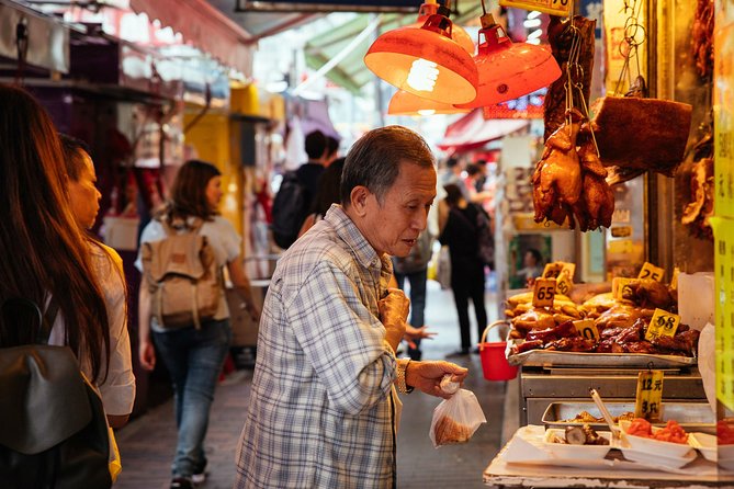 A Taste of Hong Kong: Private Tour With Locals - From Prince Edward station into Hong Kong after dark