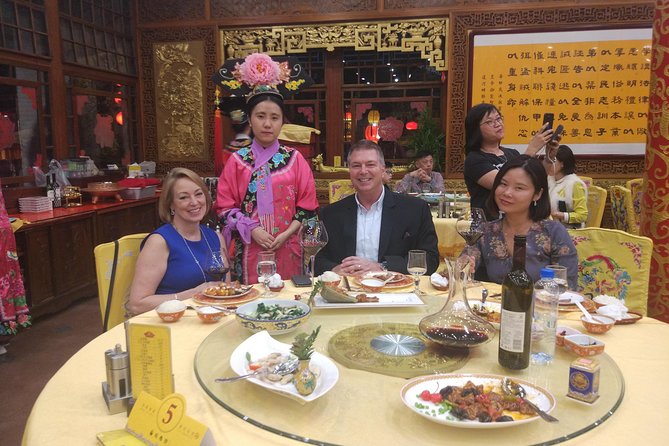 Beijing Imperial Dining Experience at Bai Jia Da Yuan Restaurant with Houhai Lake Bar Tour - Entering the Qing-era palace at Bai Jia Da Yuan