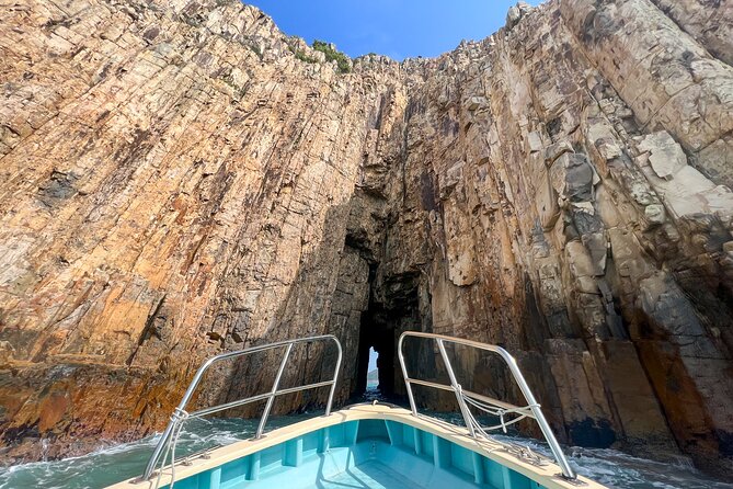 Boat Tour Through Four Sea Arches in Sai Kung, Hong Kong Geopark - Bluff Island’s sea tunnel