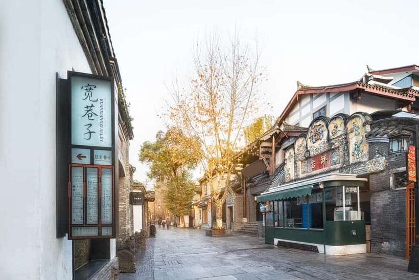 Chengdu: City Walking Tour with Food and Culture Stops - Daci Temple and Taikoo Li: red walls beside glass towers