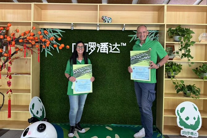 Chengdu: Volunteer Day Experience at Dujiangyan Panda base - The conservation film and panda cake workshop