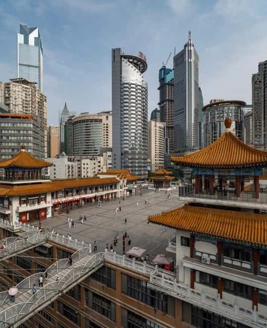 Chongqing: Surreal Urban, Ancient Town, and Secret Viewpoint - Liziba: the monorail that enters a residential tower