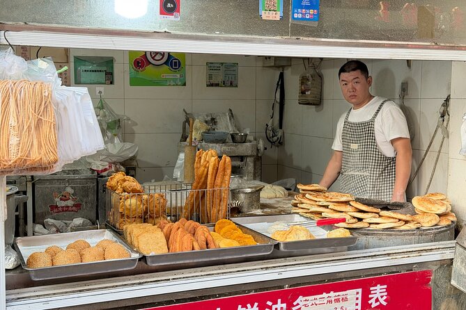 Discover Local Life and Street Food Shanghai Bike Adventure - Through local lanes and working neighborhoods