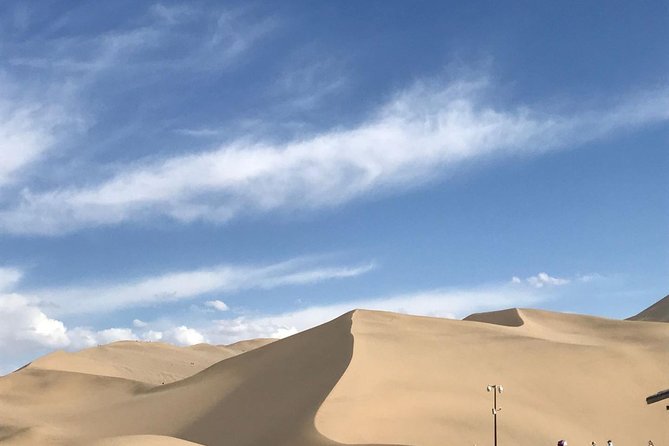 Dunhuang Private Day Tour Mogao Grottoes, Singing Dunes and Crescent Moon Spring - Key points to know before booking