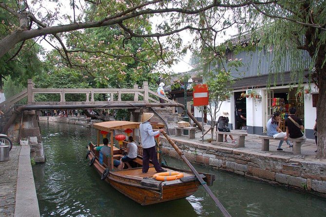 From Shanghai: Zhujiajiao Water Town Private Tour with Boat Ride - The traditional temple and local culture