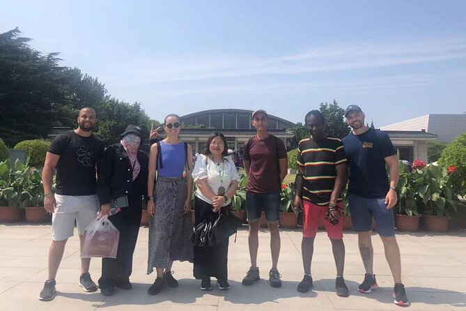 Group Tour to the Terra-cotta Warriors Museum & Lunch - Entering the Museum of Qin Terra-cotta Warriors and Horses