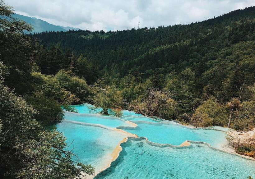 Huanglong Scenic Area: Explore Stunning Five-Colored Ponds - What the $40 price really gives you