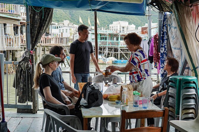 Lantau Island Day Trip Big Buddha & Tai O Includes Cable Car - Riding Ngong Ping 360 above Lantau