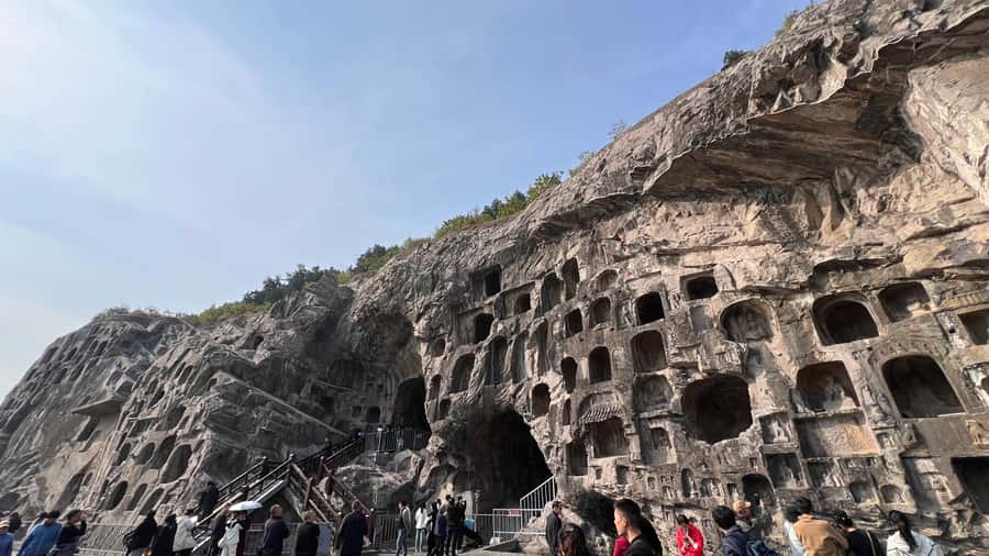 Luoyang: Day tour from Xian or LuoYang with tickets options - Entering the Longmen Grottoes