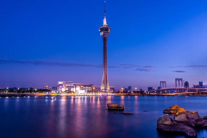 Macau Tower Admission Ticket - The ride up in a glass-fronted elevator