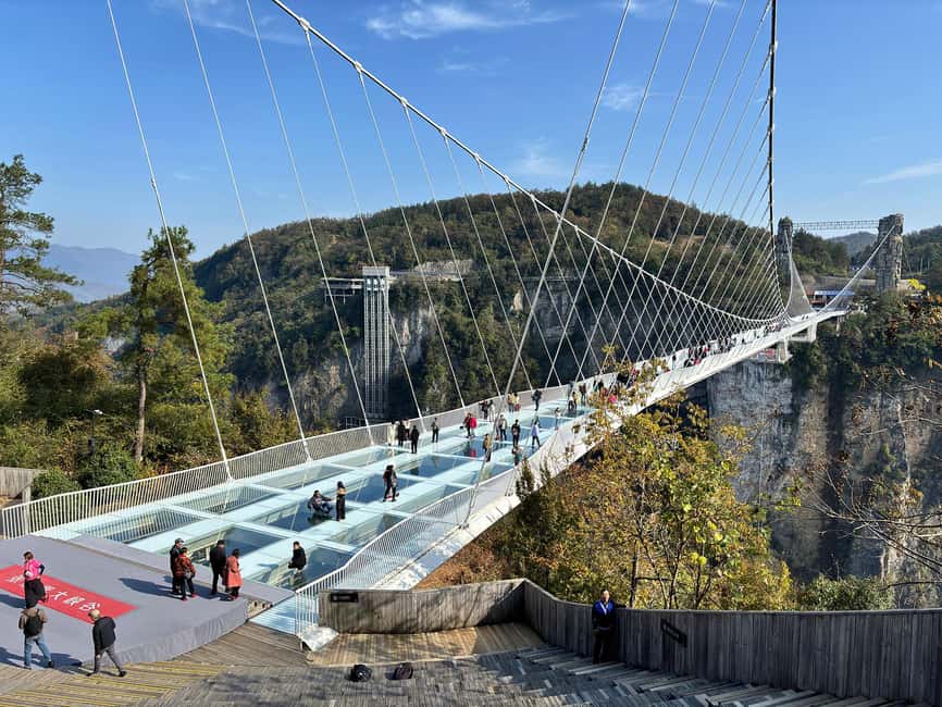 One Day Mini Group Tour to Glass Bridge and Tianmen Mountain - The glass skywalk and included shoe covers