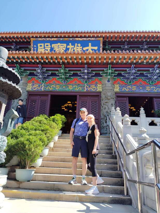 Premium Lantau Tour with Cable Car tickets & English Guide - Arriving at Ngong Ping Village
