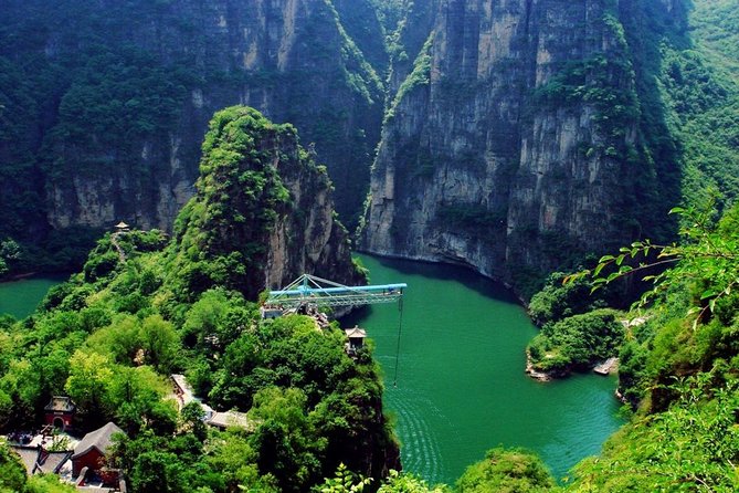 Private Day Tour to Longqing Gorge with Boat Ride and Cable Car from Beijing - The dragon-shaped elevator and Longqing Dam