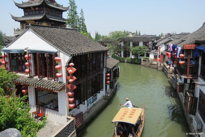 Private Full Day Tour: Zhujiajiao Ancient Water Town with Best of Shanghai - Snacks that make the town visit more memorable