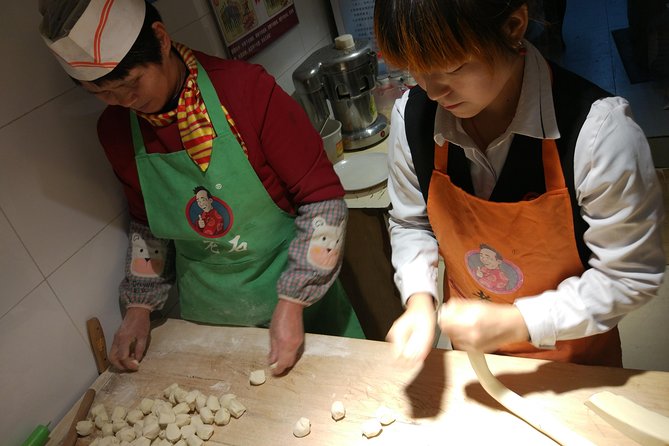 Private Hutong Culture Tour with Dumpling Cooking Class plus Cricket Fighting Game - Making dumplings turns lunch into an activity