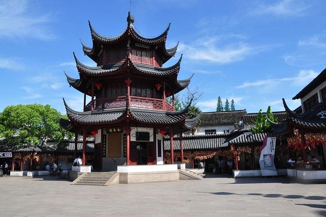 Private Qibao Ancient Town Walking Tour with Tea Tasting and Calligraphy Experience - Hotel pickup and the ride from Shanghai