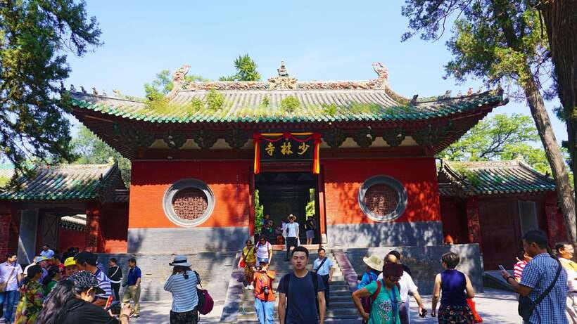 Private Tour: Longmen Grottoes, Shaolin Temple & Kungfu Show - Walking through Longmen Grottoes