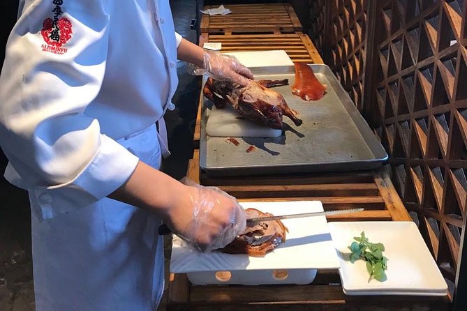 Private Tour to Pearl Market Acrobatic Show & Peking Duck Dinner - Red Theatre acrobatics, the evening’s strongest payoff