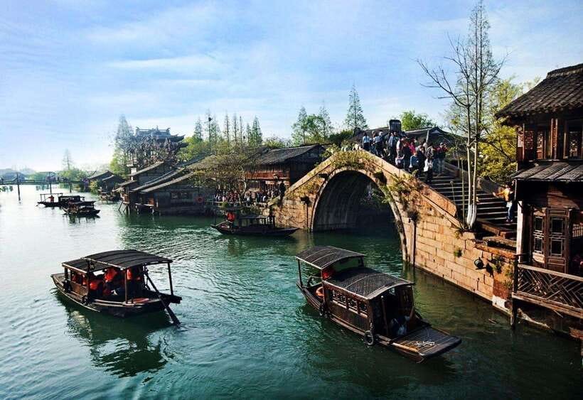 Private Tour:Zhujiajiao Water Town by German-Speaking Guide - Hotel pickup in a private air-conditioned car