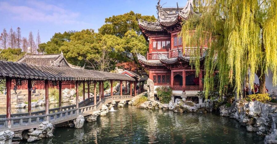 Shanghai: 4-Hour Guided City Highlights Tour - Yuyuan Garden: classical design and a busy bazaar