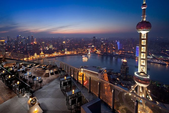 Shanghai Authentic Dinner and Night River Cruise with Rooftop Bar Hopping Option - Dinner brings the local flavor