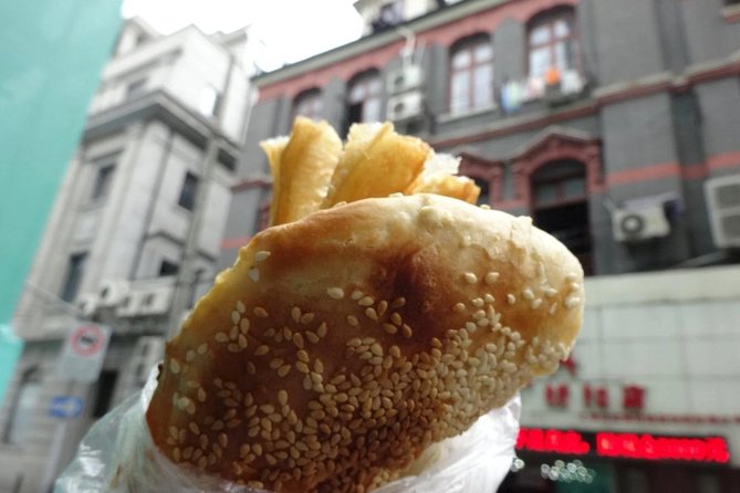 Shanghai Breakfast Walking Tour of Former French Concession - Noodles, toppings, and a tea shop