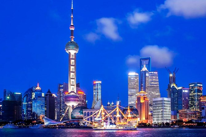 Shanghai Night River Cruise Tour with Xinjiang Style Dining Experience - The One-Hour Cruise: Bund Buildings and Pudong Towers