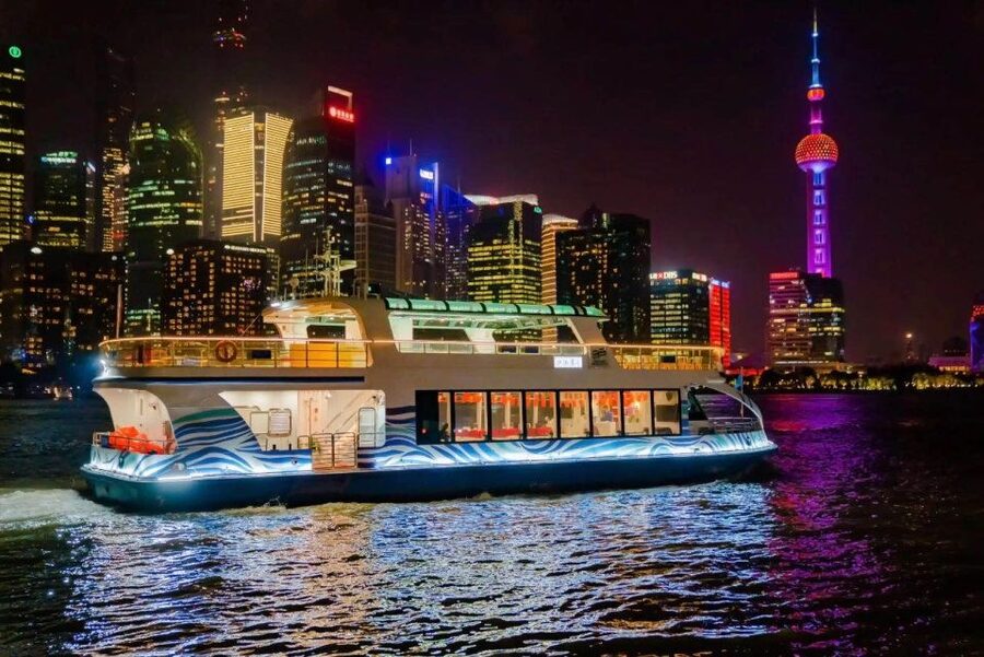 Shanghai: Night River Cruise Tour with Xinjiang Style Dining - Timing the Lights, Not Just the Sunset