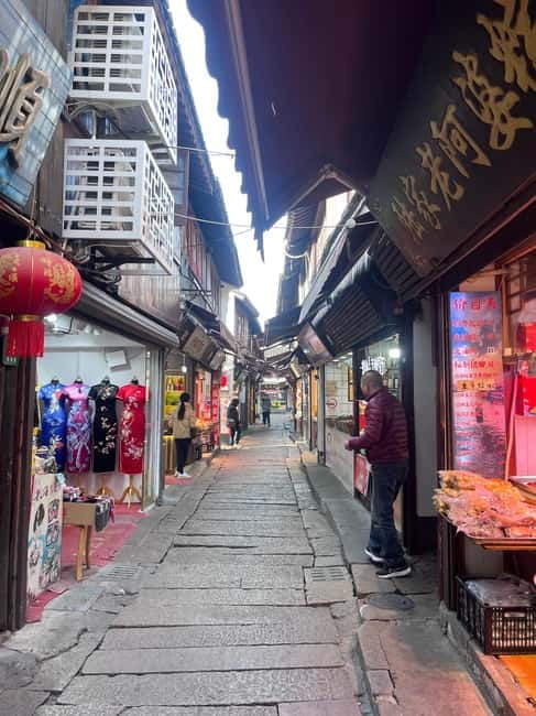Shanghai: Zhujiajiao Water Town with Calligraphy Experience - Who will enjoy this Zhujiajiao tour?