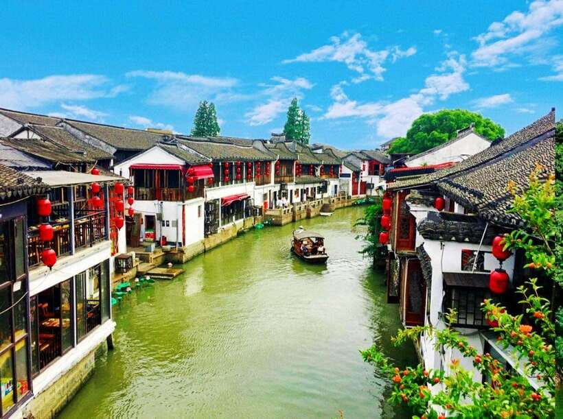 Shanghai: Zoo and Zhujiajiao Water Town Tour with Boat Ride - The drive to Zhujiajiao changes the mood
