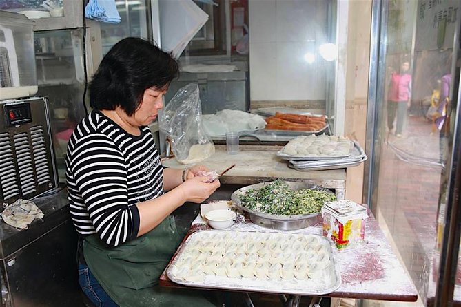 Small Group Kowloon Michelin Rated Street Food and Culture Tour - Yau Ma Tei: fruit crates, temple smoke, and an older Kowloon