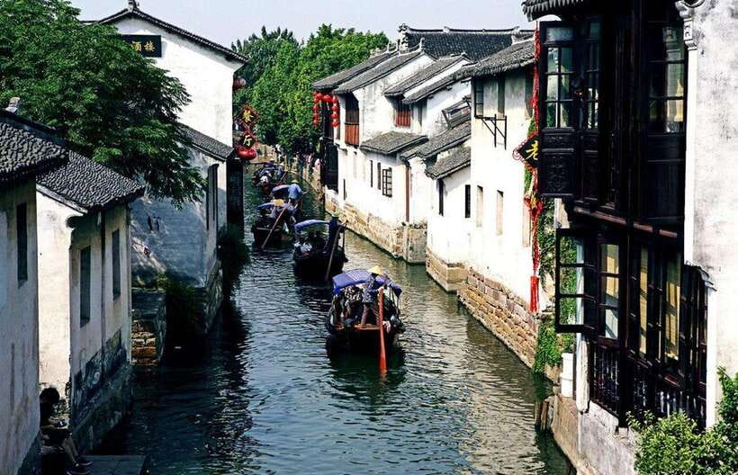 Suzhouand Zhouzhuang Private Guided Day Trip from Shanghai - Zhouzhuang: canals, old lanes, and water-market life