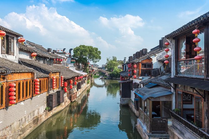 Wuzhen and Xitang Water Town Private Full Day Trip from Shanghai with Lunch and Dinner - Wuzhen: canals, bridges, and a boat ride