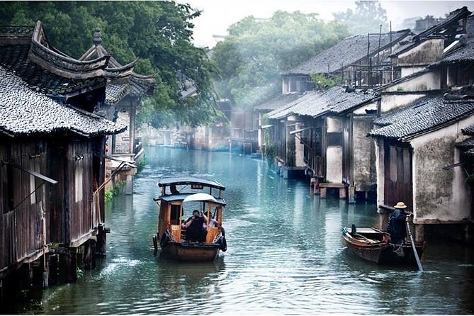 Wuzhen Water Town Delight Tour With Riverside Lunch Experience - The private wooden boat ride: worth adding?