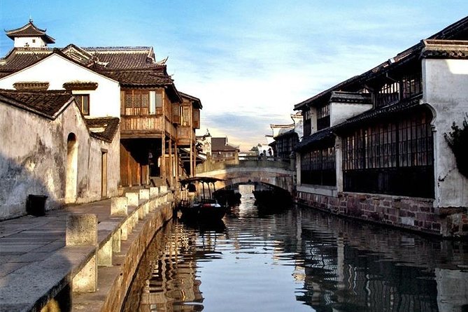 Wuzhen Water Town Private Day Tour from Hangzhou - Shadow puppets, traditional music, and the river cruise