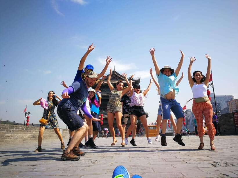 Xi'an: City Wall & Old Town Walking Tour w/ 10+ Food Tasting - Starting at your hotel and reaching the City Wall