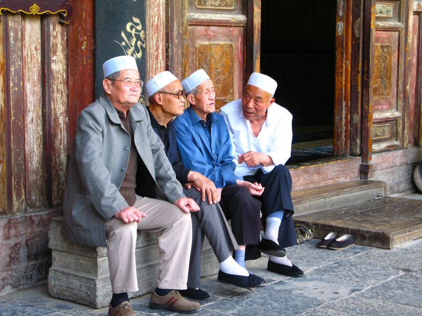 Xi'an Muslim Quarter Night Market Foodie Walking Tour - Meeting at Bell Tower or adding hotel pickup
