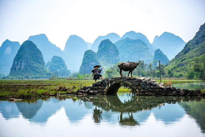 Xingping Xianggong Hill and Yangshuo Countryside Classic Day Tour - Crossing the Li River at Xingping