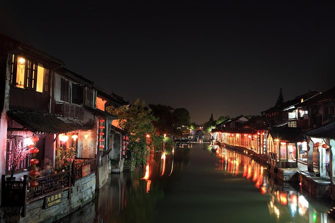 Xitang Water Village Sunset Tour with Riverside Dining Experience from Shanghai - Jinze’s quiet canals and traditional boat ride