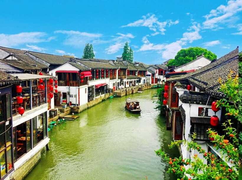 Zhujiajiao Water Town Private Tour with Night River Cruise - The water market and local street life